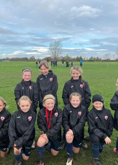 Morecambe Girls Football Club Sport their New JT Training Kit